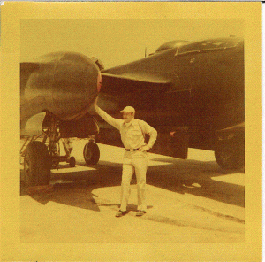 Ray posing with a Douglas A-26 in Korea.